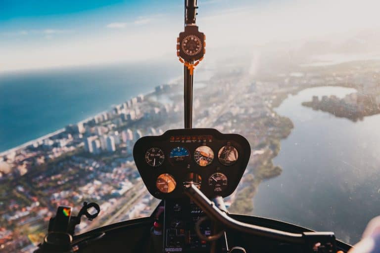 Helicopter flying over Fort Lauderdale with a view of the city out the front window of the helicopter